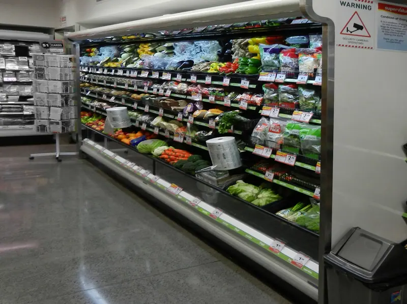 Fresh produce held at temperature in an open display cabinet